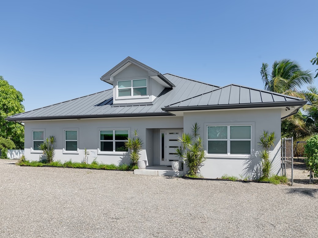 Elevated, 6-bedroom Single Family Home On A Massive Parcel
